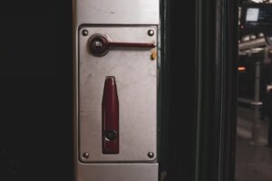 Lever-style door handle on commercial door