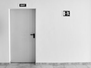 Commercial kitchen exit door with push bar hardware