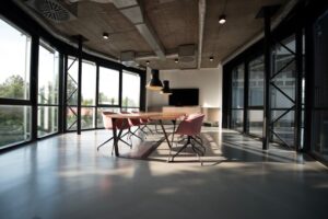 Wide-angle view of a modern office interior with large windows and open space