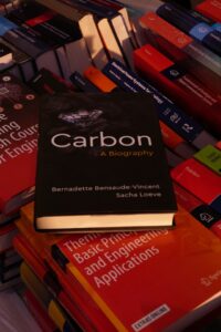 Copies of IECC and ASHRAE 90.1 energy codes stacked on a desk