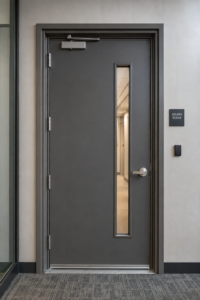 Soundproof door with acoustic seals in a commercial building