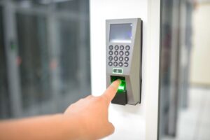 Biometric fingerprint scanner on a commercial building door