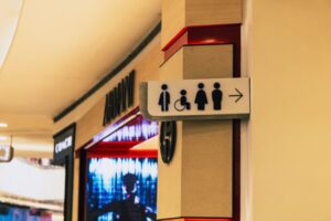 All-gender restroom with clear signage and accessible design
