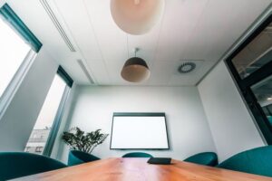 Sound masking system speaker on an office ceiling