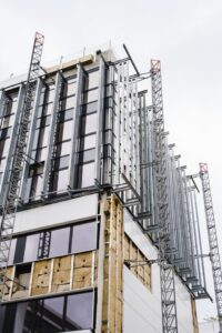 Thermal break system being installed on a commercial building balcony