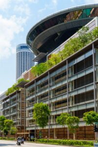 Sustainable commercial building with energy-efficient glass and landscaping