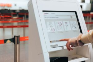 Visitor management kiosk in a commercial building lobby