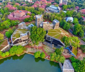 Aerial view of a sustainable commercial campus with green roofs and landscaping
