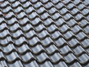 Comparison of Class A roofing materials including slate, clay tiles, and standing seam metal.